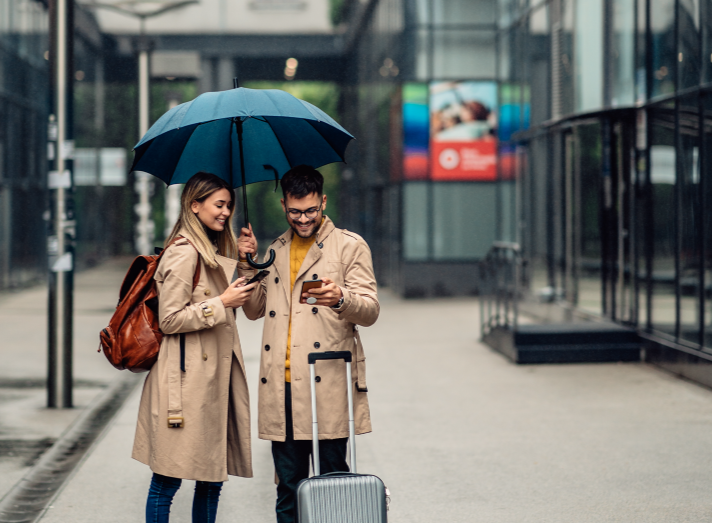 Woman and man umbrellas, coverage